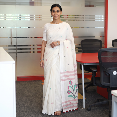 White Phulia Jamdani Pure Handloom Cotton Saree with Tassels (Count 92/84), draped and worn by a woman, AI visual of the saree, iTokri