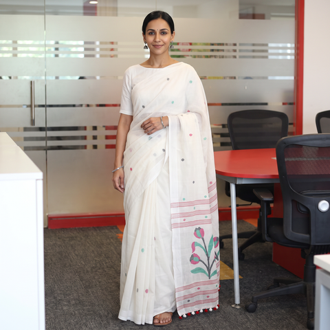 White Phulia Jamdani Pure Handloom Cotton Saree with Tassels (Count 92/84), draped and worn by a woman, AI visual of the saree, iTokri