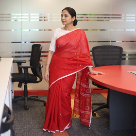 Red Phulia Jamdani Pure Handloom Cotton Saree with Tassels (Count 92/84), draped and worn by a woman, AI visual of the saree, iTokri