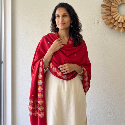 Pink Phulkari Hand Embroidered Wool Shawl, worn by a model, AI visual of the shawl, iTokri