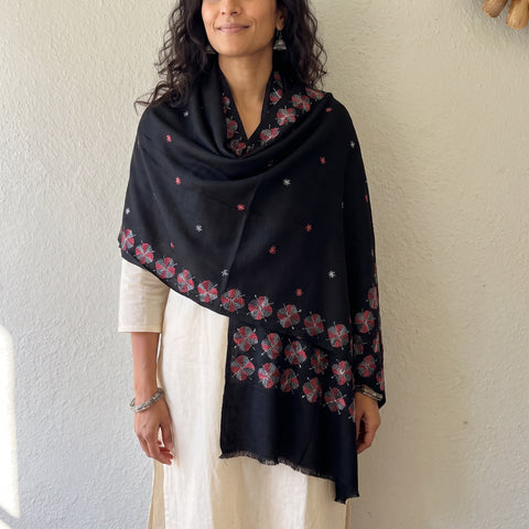 Black Phulkari Hand Embroidered Wool Shawl, worn by a model, AI visual of the shawl, iTokri