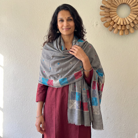 Grey Phulkari Hand Embroidered Wool Shawl, worn by a model, AI visual of the shawl, iTokri