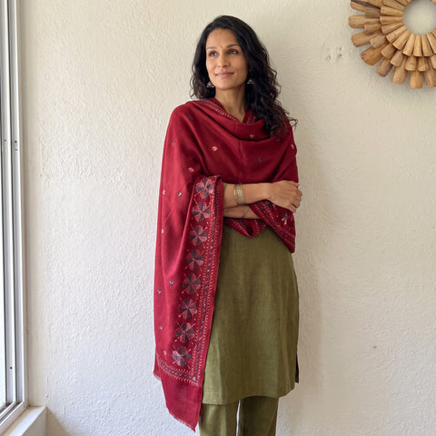Red Phulkari Hand Embroidered Wool Shawl, worn by a model, AI visual of the shawl, iTokri
