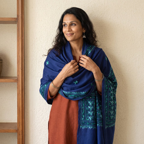 Blue Phulkari Hand Embroidered Wool Shawl, worn by a model, AI visual of the shawl, iTokri