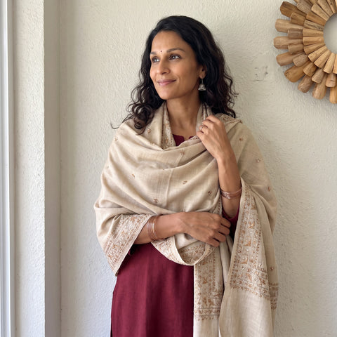 Beige Phulkari Hand Embroidered Wool Shawl, worn by a model, AI visual of the shawl, iTokri