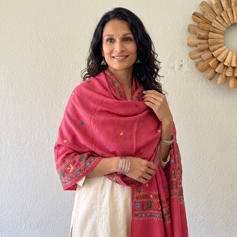 Pink Phulkari Hand Embroidered Wool Shawl, worn by a model, AI visual of the shawl, iTokri
