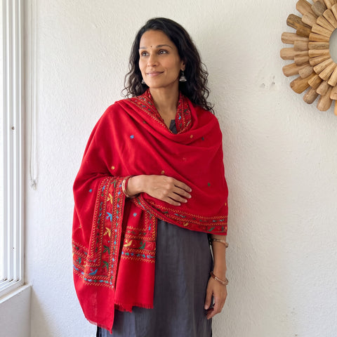 Red Phulkari Hand Embroidered Wool Shawl, worn by a model, AI visual of the shawl, iTokri