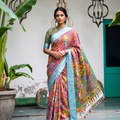 Whole saree from the front: pink pen Kalamkari silk cotton with a sky blue silvery border, AI visual of the saree, iTokri