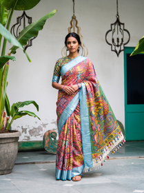 Whole saree from the front: pink pen Kalamkari silk cotton with a sky blue silvery border, AI visual of the saree, iTokri