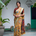 Mustard yellow Srikalahasti pen Kalamkari silk cotton saree with red pallu, full front view, AI visual of the saree, iTokri
