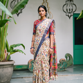 Cream Srikalahasti pen Kalamkari silk cotton saree with royal blue border, full front view, AI visual of the saree, iTokri