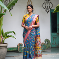 Front view, head to toe, of the blue Srikalahasti silk cotton saree with a pink border, AI visual of the saree, iTokri