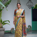 Yellow Srikalahasti pen Kalamkari silk cotton saree with sky blue border, full front view, AI visual of the saree, iTokri