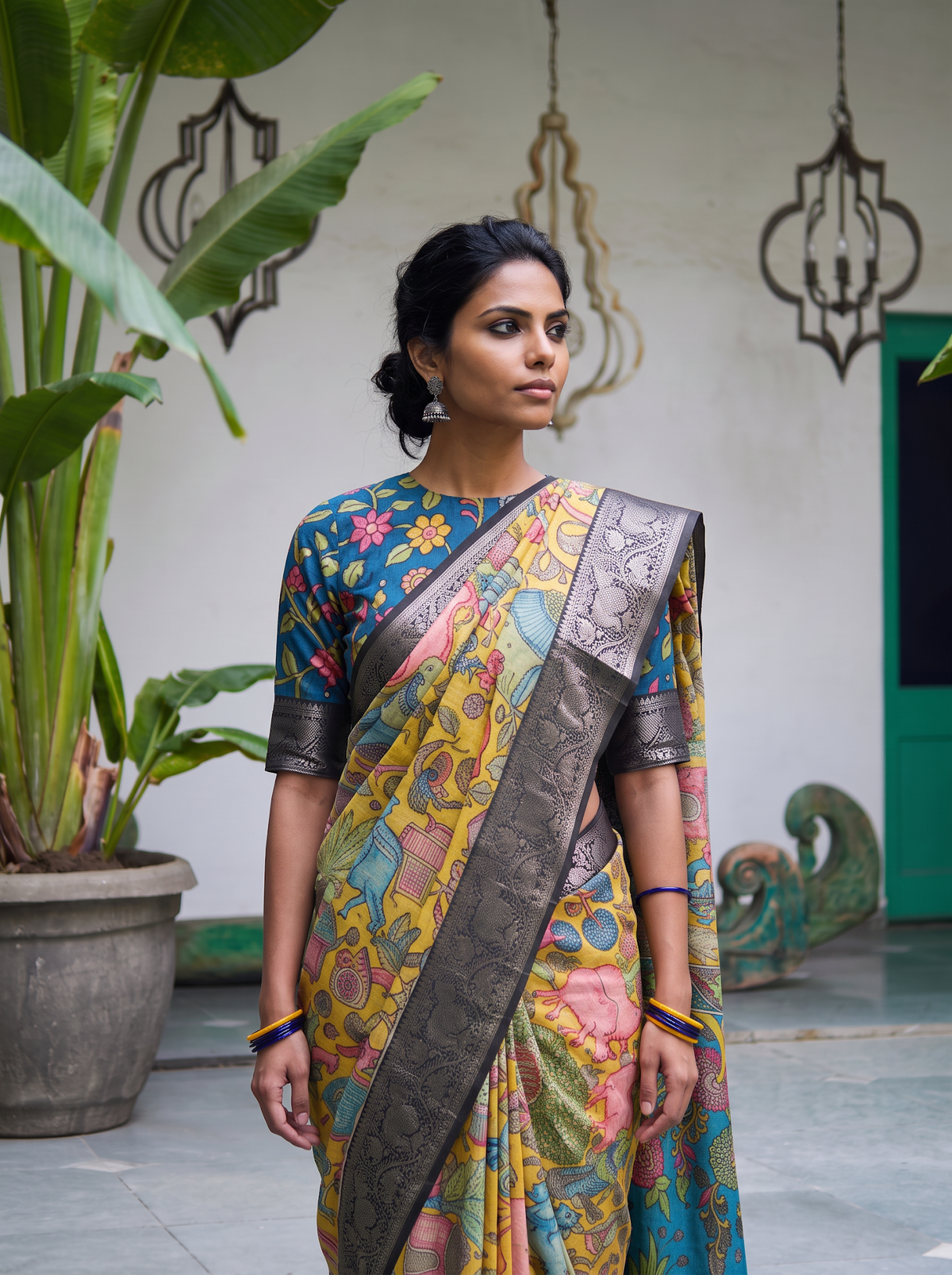Black and silver border over the shoulder of the yellow Kalamkari saree, close front view, AI visual of the saree, iTokri