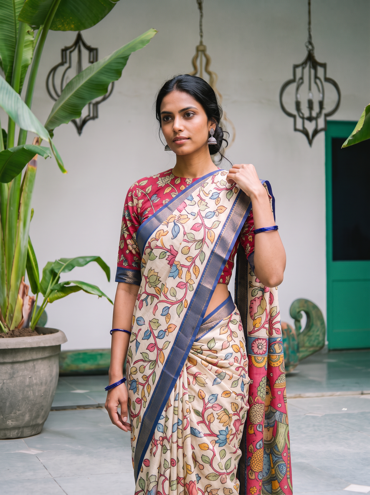 Close front view of the cream lotus vine Kalamkari saree and its blue border, AI visual of the saree, iTokri