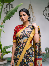 Close front view of the mustard border and pastel flowers on black, AI visual of the saree, iTokri
