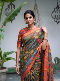 Painted village body and rust orange border of the green Kalamkari saree, close front view, AI visual of the saree, iTokri
