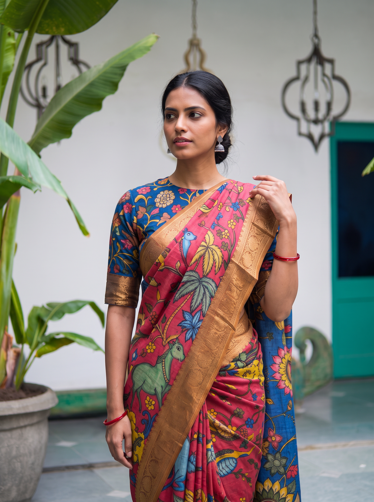 Painted deer and trees on the pink body with the gold border, close front view, AI visual of the saree, iTokri