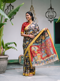 Red village scene pallu held out wide from the black Kalamkari saree, AI visual of the saree, iTokri