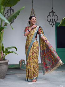 Red pallu of the yellow Kalamkari saree held out to show the painted peacocks, AI visual of the saree, iTokri