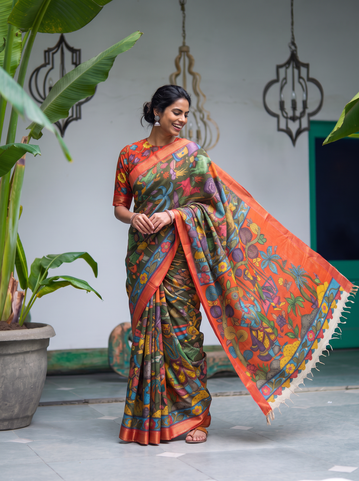 Rust orange pallu of the Srikalahasti Kalamkari saree held out to show painted figures, AI visual of the saree, iTokri