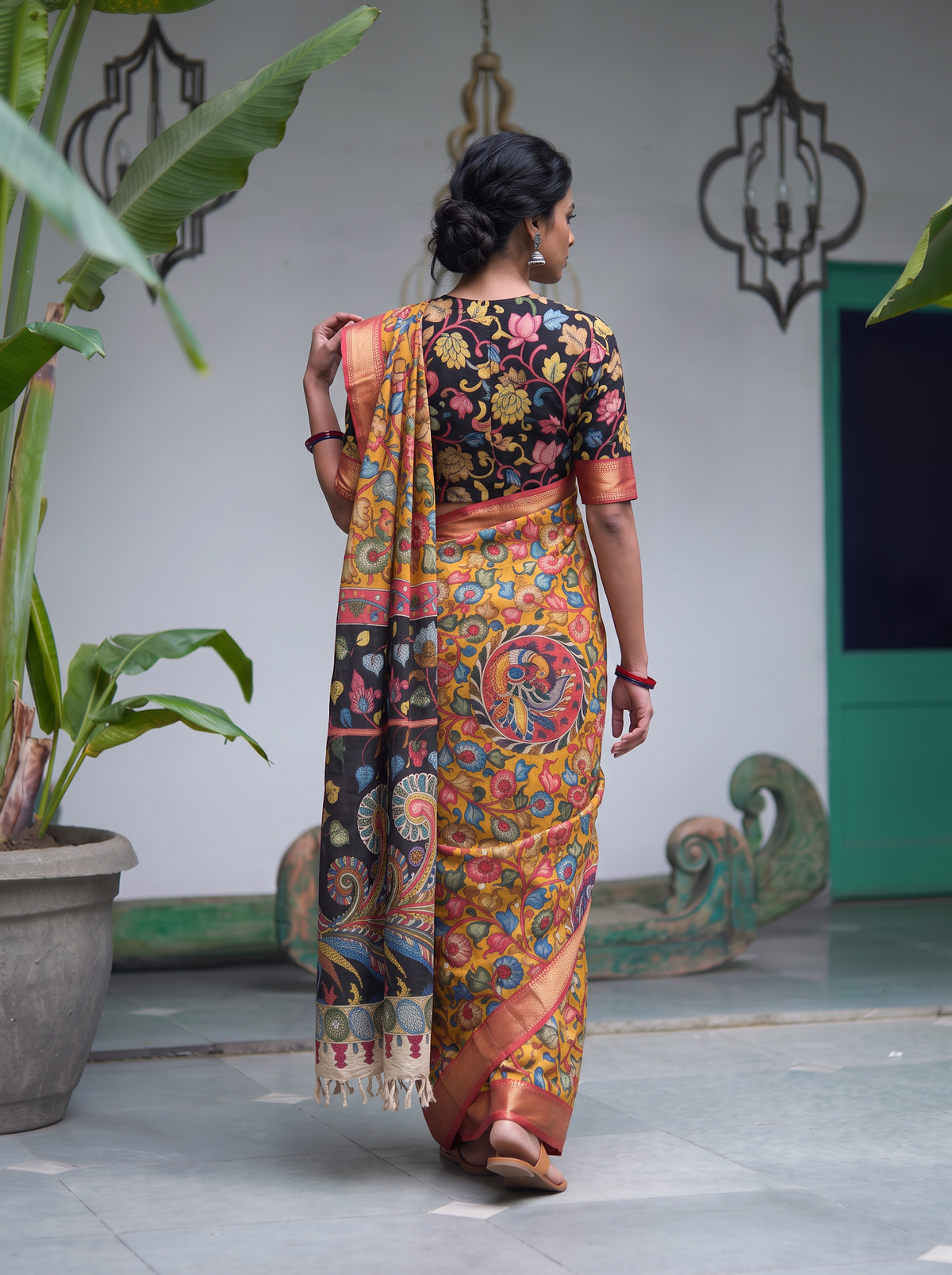 Back of the mustard pen Kalamkari saree with a peacock medallion and black pallu, AI visual of the saree, iTokri