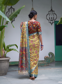 Back of the yellow Kalamkari saree, red peacock pallu hanging from the shoulder, AI visual of the saree, iTokri