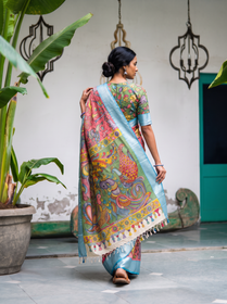 Back view of the pink saree, its green bird pallu falling from the shoulder, AI visual of the saree, iTokri