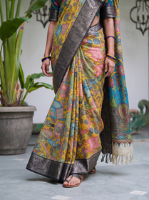 Pleats of the yellow silk cotton saree painted with huts, animals and trees, AI visual of the saree, iTokri
