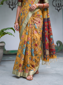 Pleats of the mustard silk cotton Kalamkari saree with the pale gold border, AI visual of the saree, iTokri