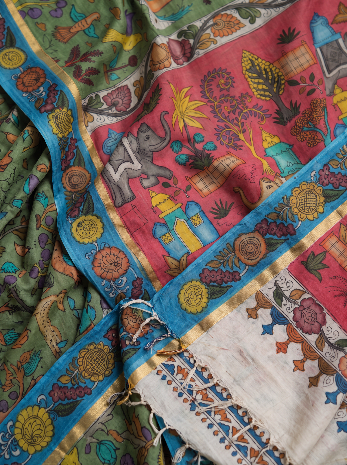 Detail of elephants and domed pavilions on coral, with the blue flower border and fringe, AI visual of the saree, iTokri