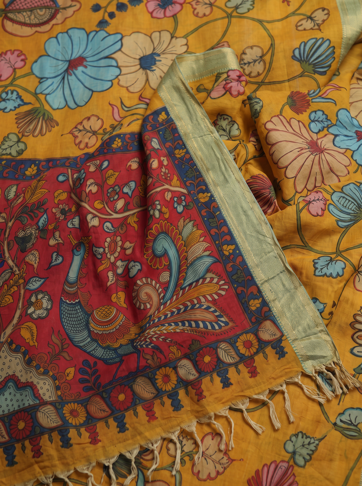 Peacock and tree on the red pallu with pale gold border and fringe, detail, AI visual of the saree, iTokri