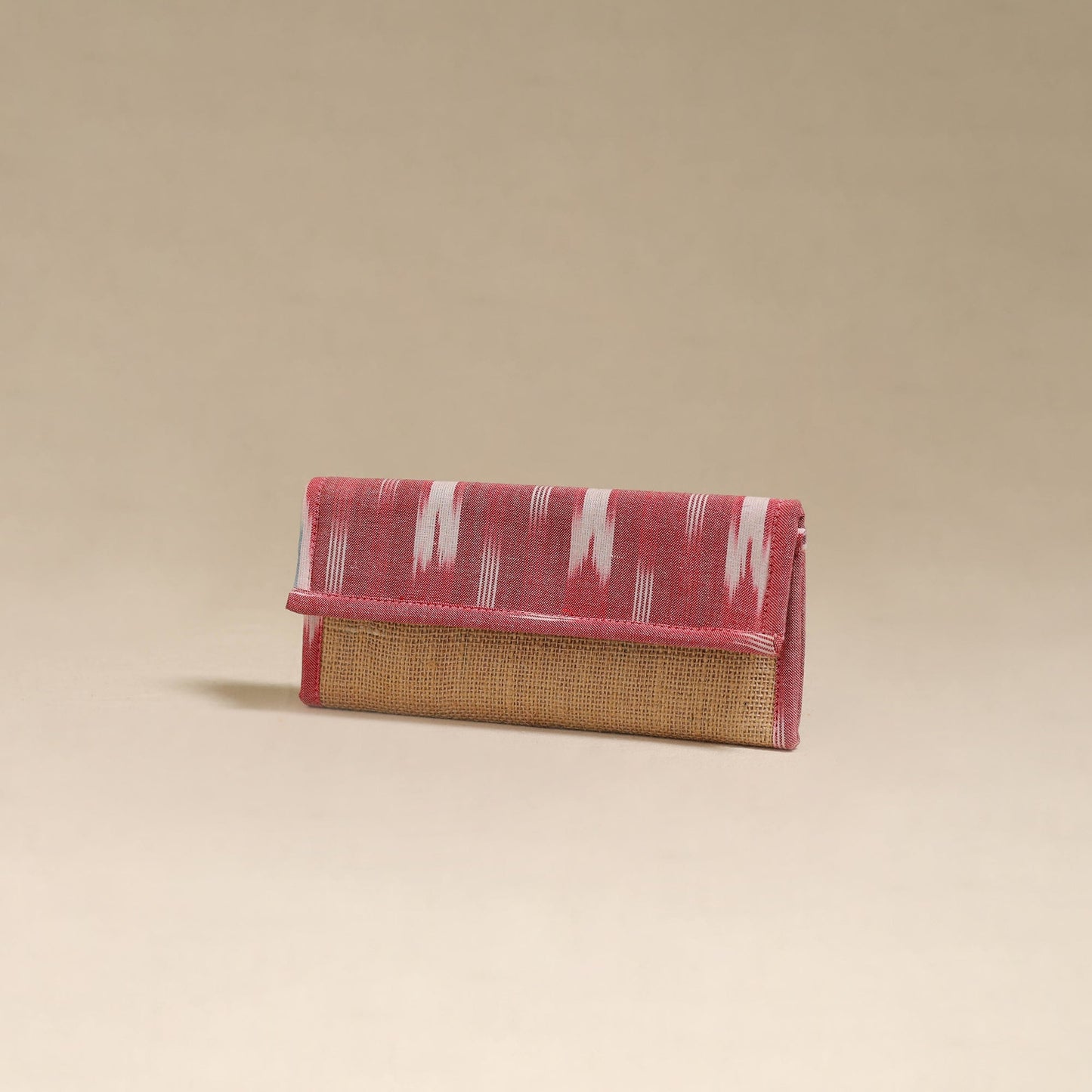 Pink - handcrafted ikat fabric jute clutch / wallet