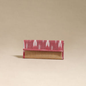 Pink - handcrafted ikat fabric jute clutch / wallet