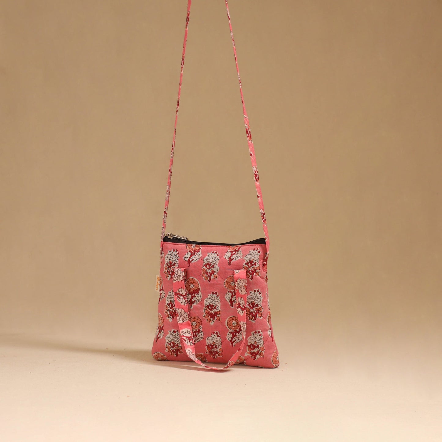 Handcrafted quilted sling bag 12