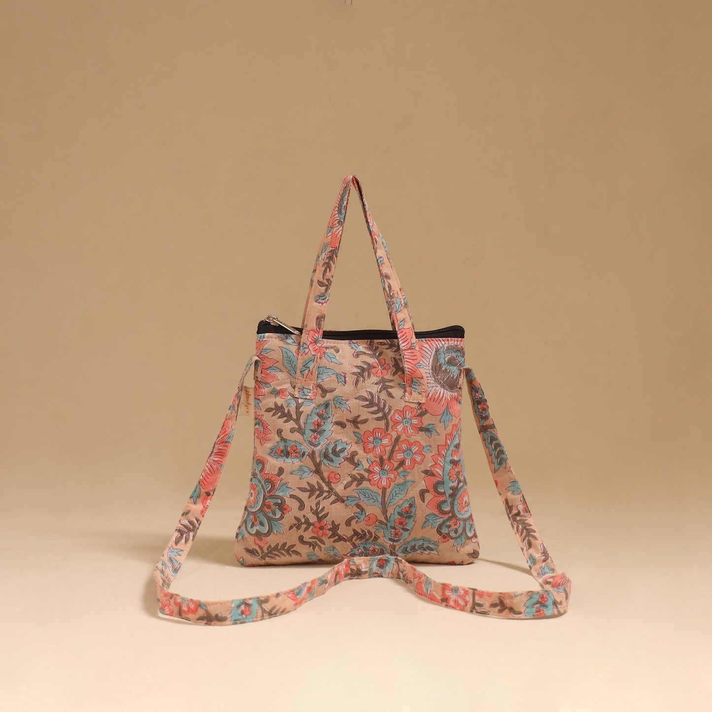Handcrafted quilted sling bag 15