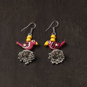Noor german silver jhumki earrings with wooden bird