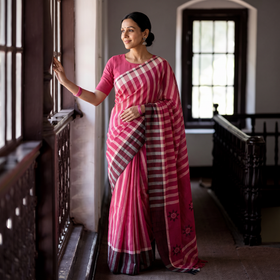 Pink, White & Black Stipe Cotton Saree with Floral Extra Weft, draped and worn by a woman, AI visual of the saree, iTokri