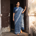 Blue Pipad Hand Block Printed Cotton Saree, draped and worn by a woman, AI visual of the saree, iTokri