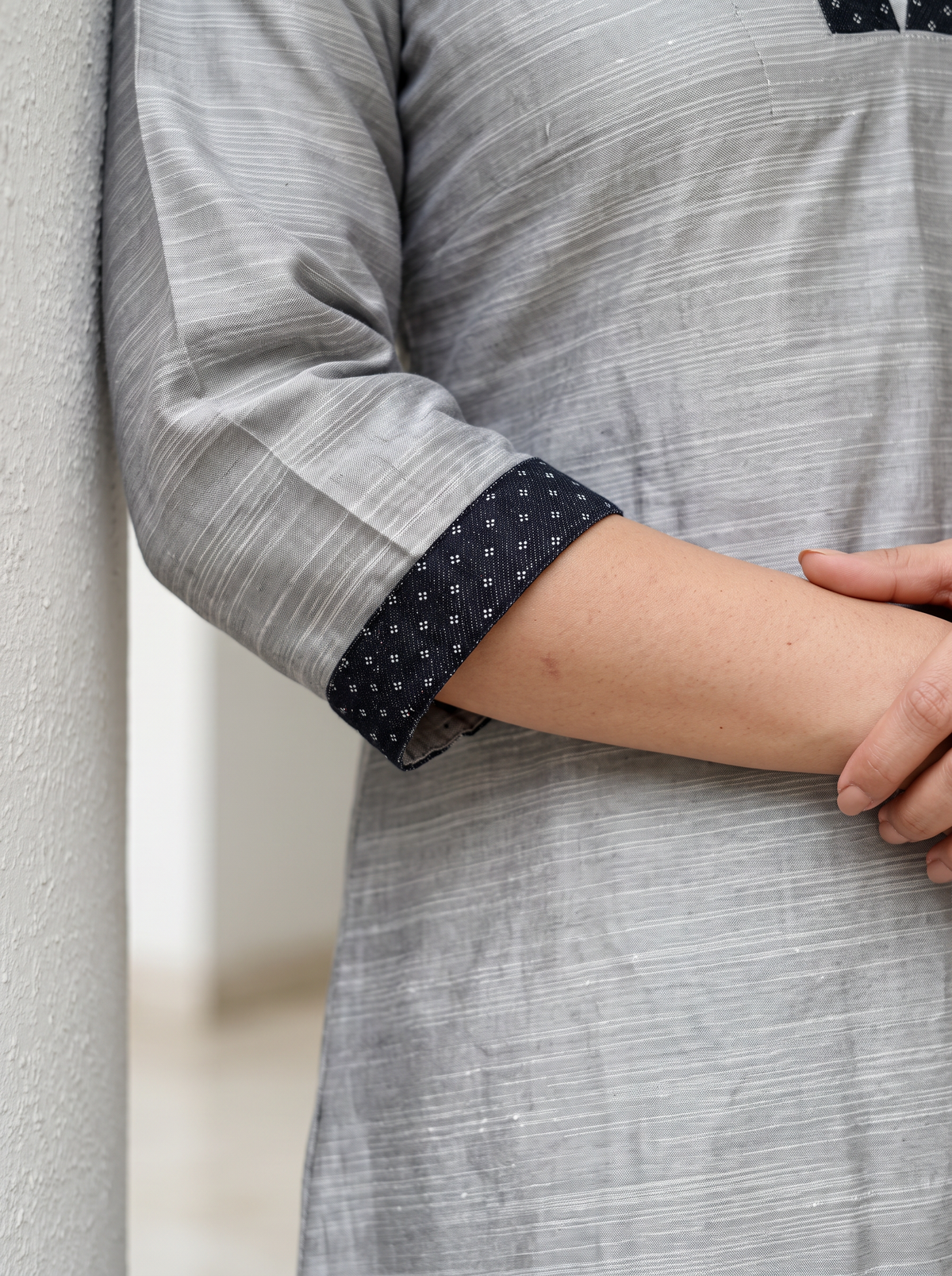 Grey Plain Art Silk Dotted V Neck Kurta, sleeve close-up, 3/4 sleeves, dotted cuffs, slits, pocket, AI visual of the kurta, iTokri
