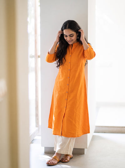 Bright Orange Plain Art Silk Full Button Placket Kurta, worn by a woman for festive wear, also office, daily wear, AI visual of the kurta, iTokri