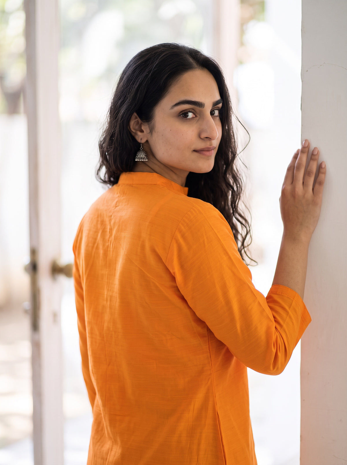 Bright Orange Plain Art Silk Full Button Placket Kurta, over the shoulder view, bright orange art silk, sheen, fine slub, AI visual of the kurta, iTokri