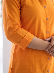 Bright Orange Plain Art Silk Full Button Placket Kurta, sleeve close-up, 3/4 sleeves, full placket, mauve buttons, AI visual of the kurta, iTokri