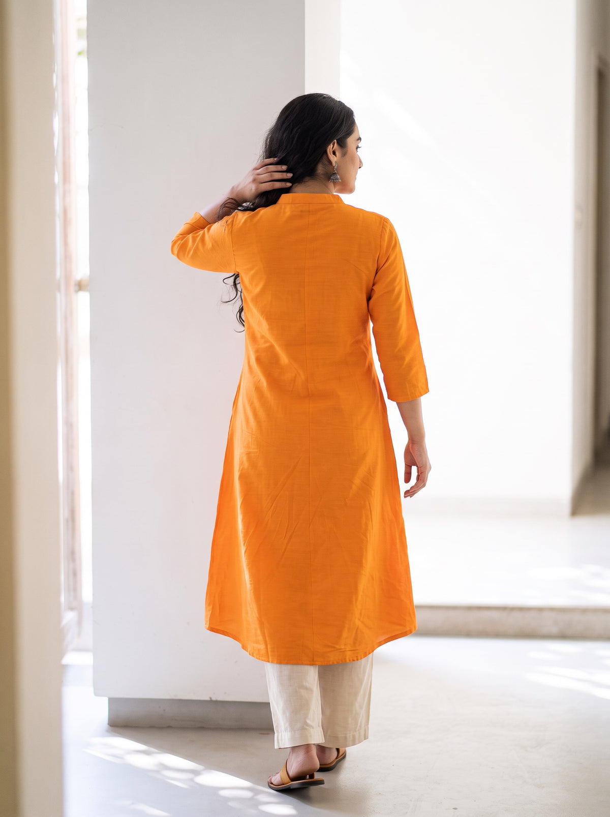 Bright Orange Plain Art Silk Full Button Placket Kurta, back view, A-line, mid-calf, band collar, keyhole, AI visual of the kurta, iTokri