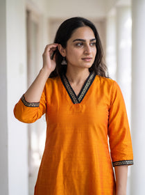 Orange Plain Art Silk Sequin Trim Kurta, front view, bright orange slub art silk, plain, soft sheen, AI visual of the kurta, iTokri