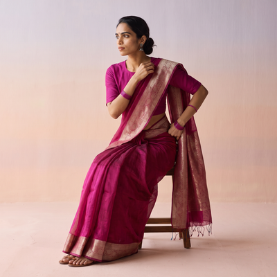 Pink Plain Banarasi Pure Handwoven Georgette Saree with Zari Border, draped and worn by a woman, AI visual of the saree, iTokri