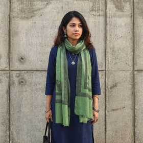 Green Plain Fine Wool Stole with Woven Border, worn by a woman, AI visual of the stole, iTokri