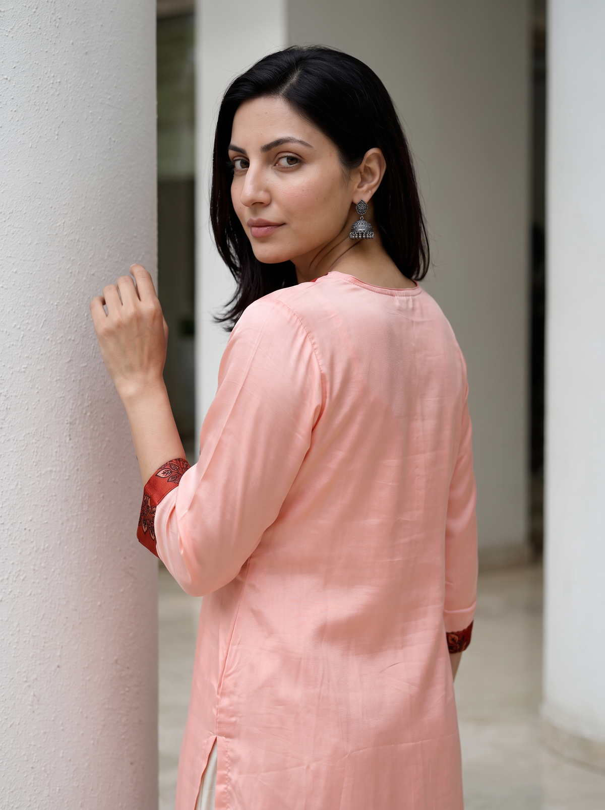 Peach Plain Modal Silk Rust Yoke Kurta, over the shoulder view, peach modal silk, sheen, rust leaf yoke, AI visual of the kurta, iTokri