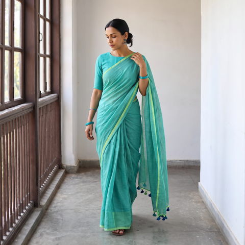 Green Plain Pure Mul Cotton Ready To Wear Saree, draped and worn by a woman, AI visual of the saree, iTokri