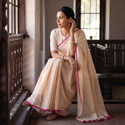 Peach Plain Pure Mul Cotton Ready To Wear Saree, draped and worn by a woman, AI visual of the saree, iTokri